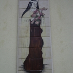 Beginning of St Theresa tile Mural before restoration